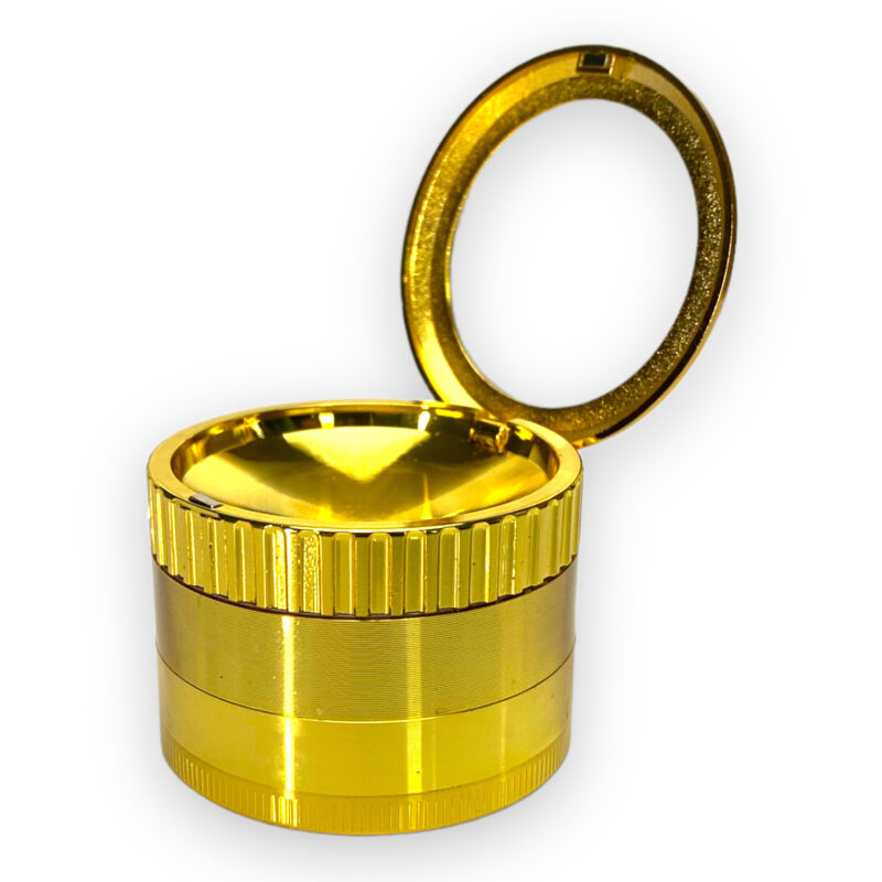 grinder złoty z otworzonym szkłem powiększającym